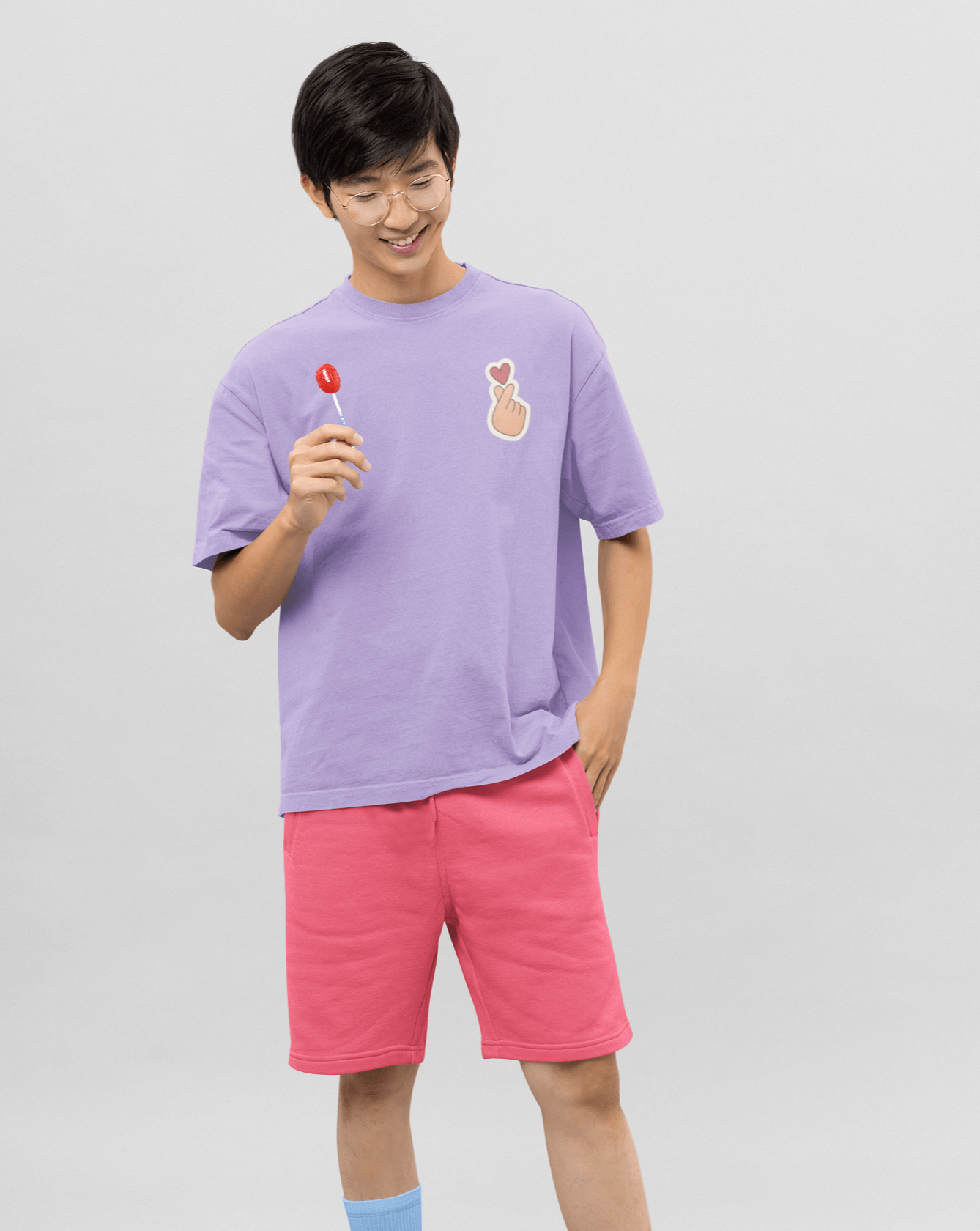 Young Korean Man Wearing Oversized T-shirt Mockup On Street - Mockup Daddy